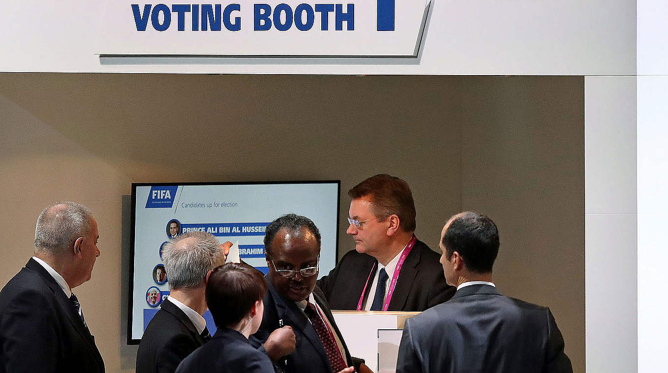 DFB treasurer Reinhard Grindel casting the German vote © Getty Images