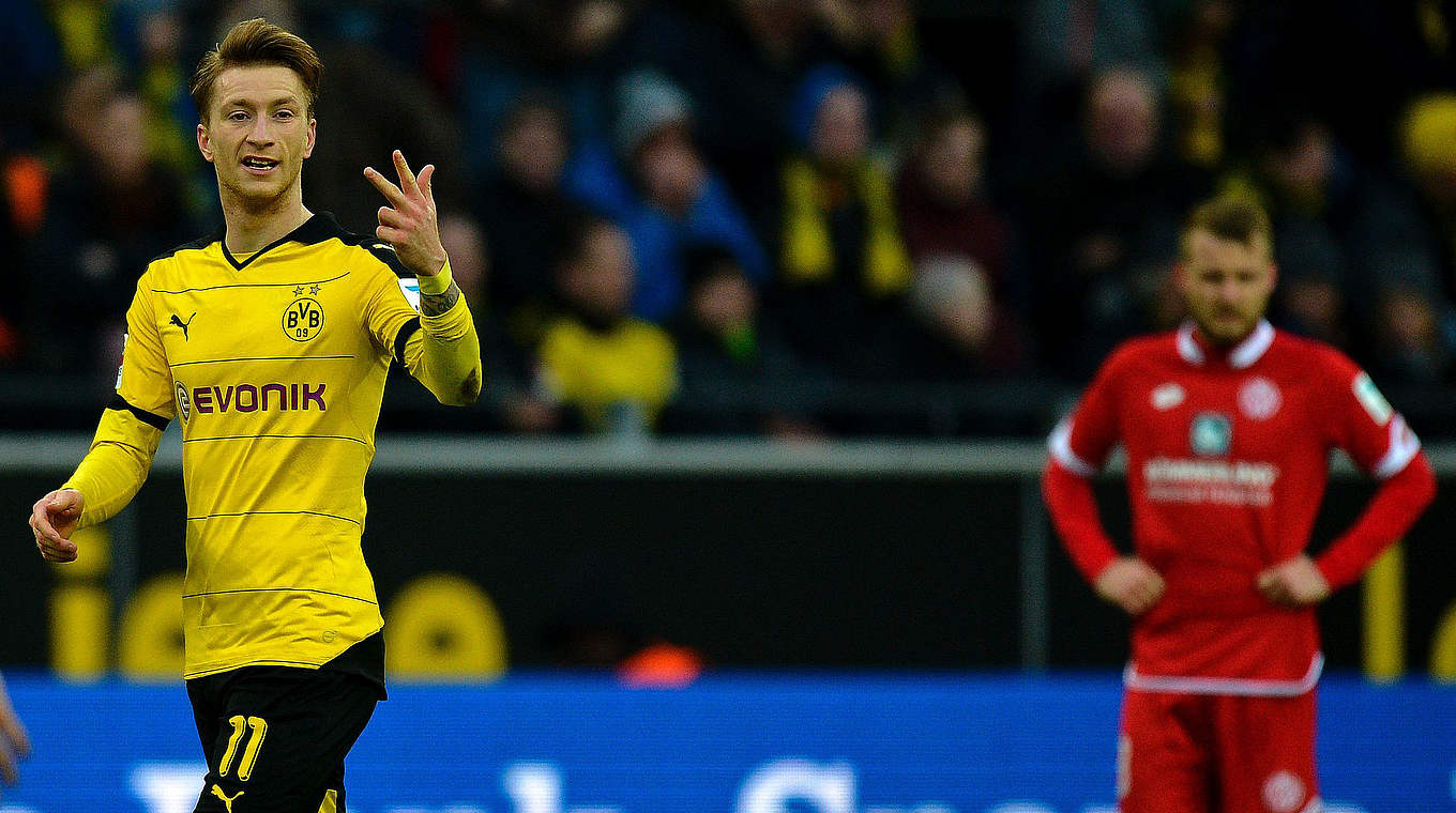 Marco Reus scored his tenth goal of the campaign to give BVB the lead © AFP / Sascha SCHUERMANN 