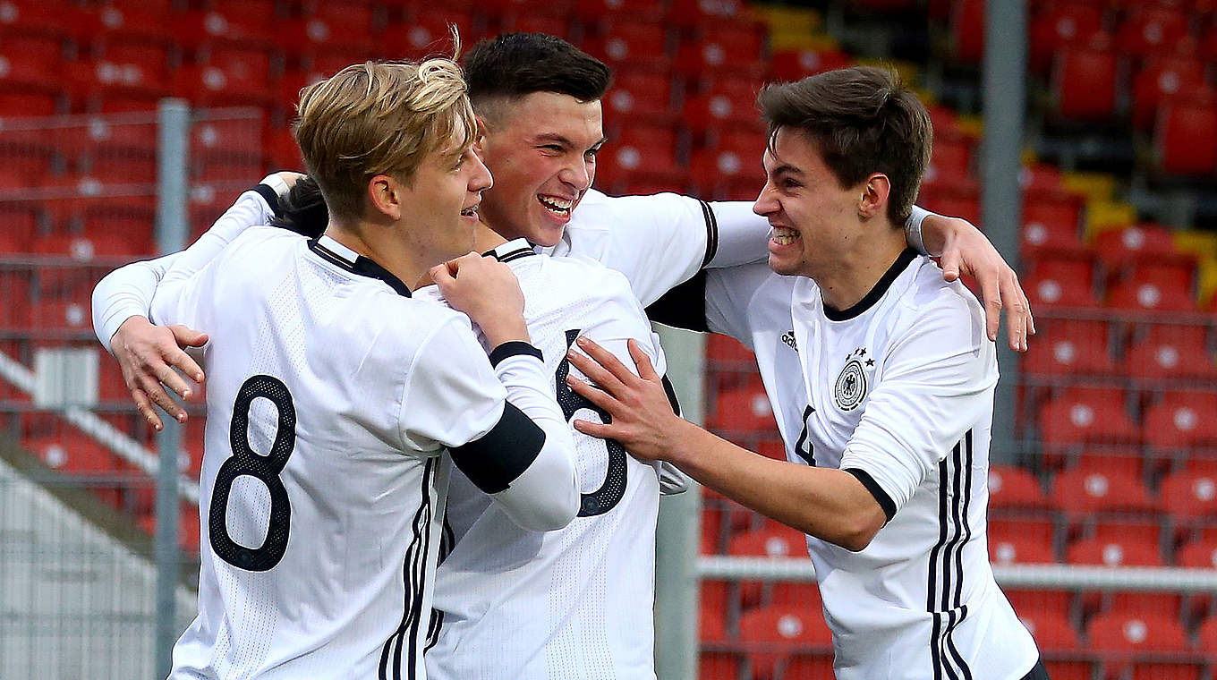 The team celebrate with Renat Dadchov after the early goal © 2016 Getty Images