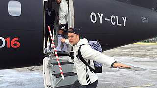 Manuel Neuer boarding the plane with his teammates as they set sail for Lille © 