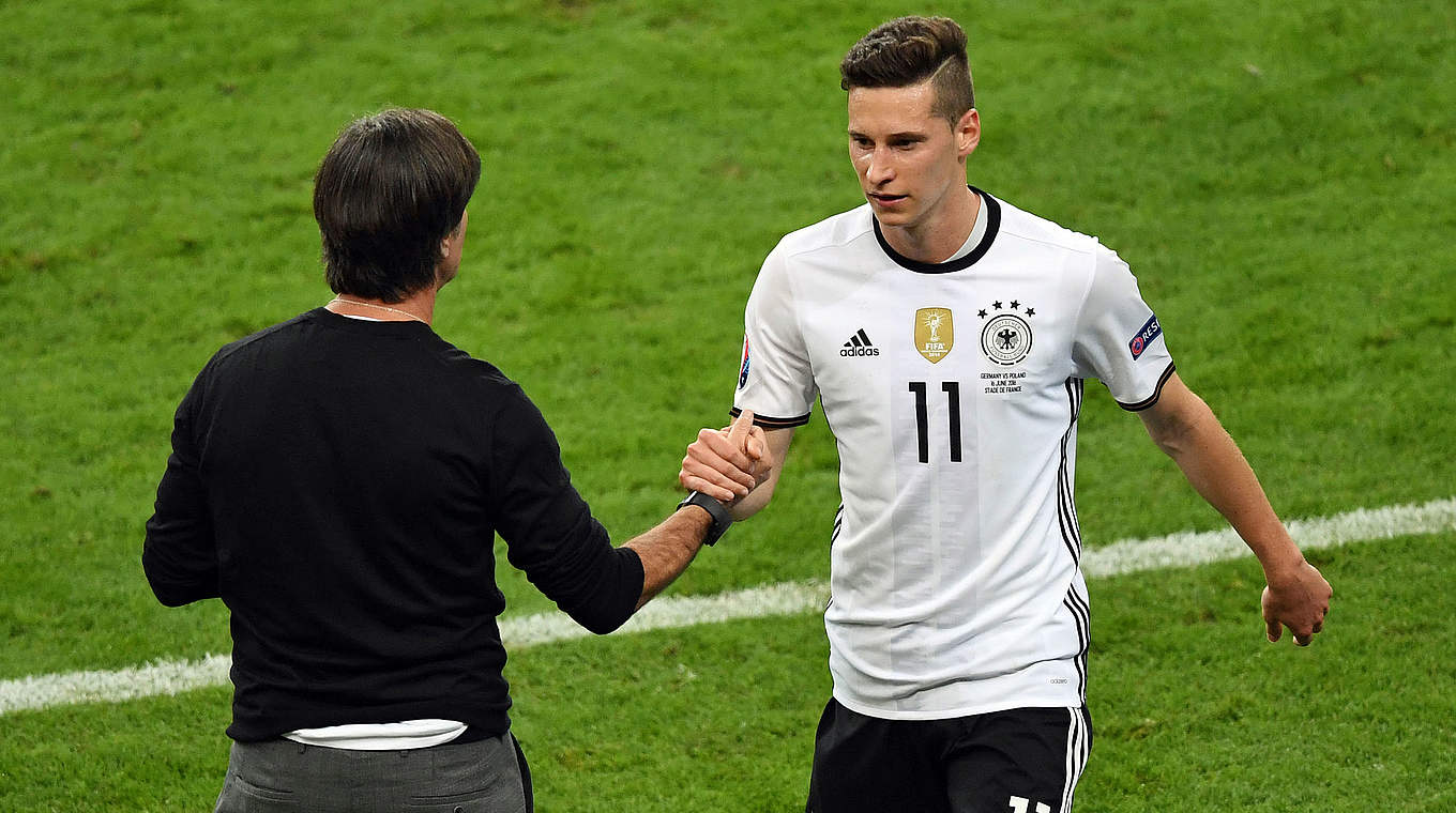 Julian Draxler with Joachim Löw: "I’m very thankful to have the trust of the manager" © AFP/Getty Images