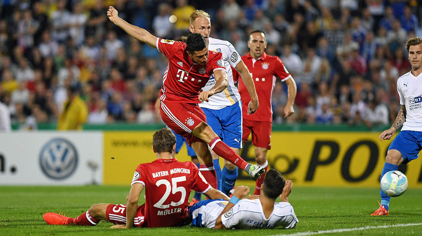 Robert Lewandowski scored a first-half hat-trick to help Bayern progress © 2016 Getty Images