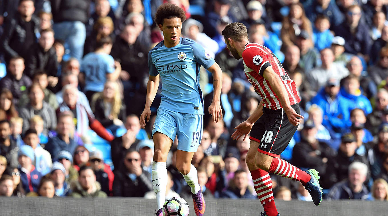 Sané takes on Southampton's Sam McQueen.  © This content is subject to copyright.