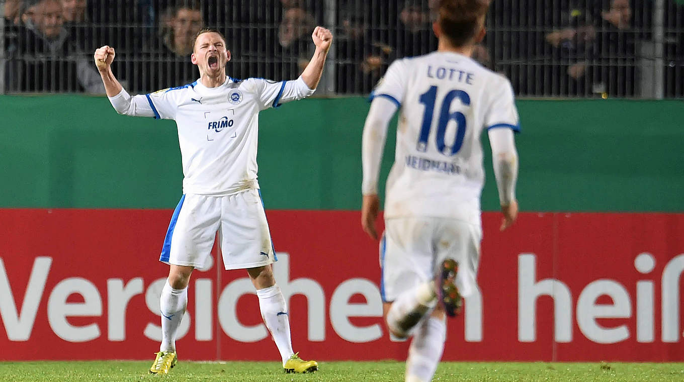 Kevin Freiburger (left) celebrates scoring against Leverkusen. © Getty Images