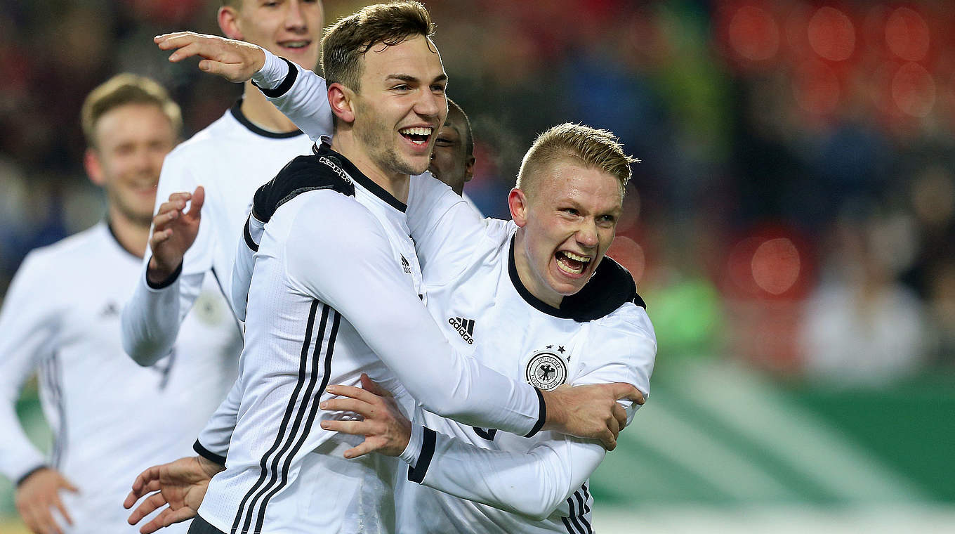 Goalscorers Philipp Ochs and Benedikt Gimber celebrate Germany U20's win.  © 2016 Getty Images