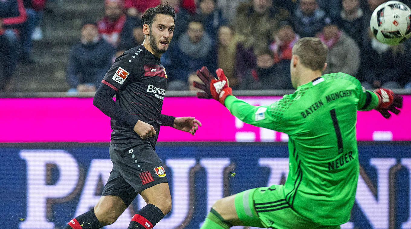 Hakan Calhanoglu fires past Neuer to equalise for Leverkusen.  © 2016 Getty Images