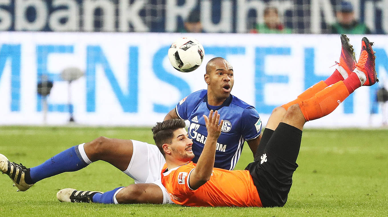 Schalke's Naldo and Darmstadt's Antonio Colak battle for possession © 2016 Getty Images