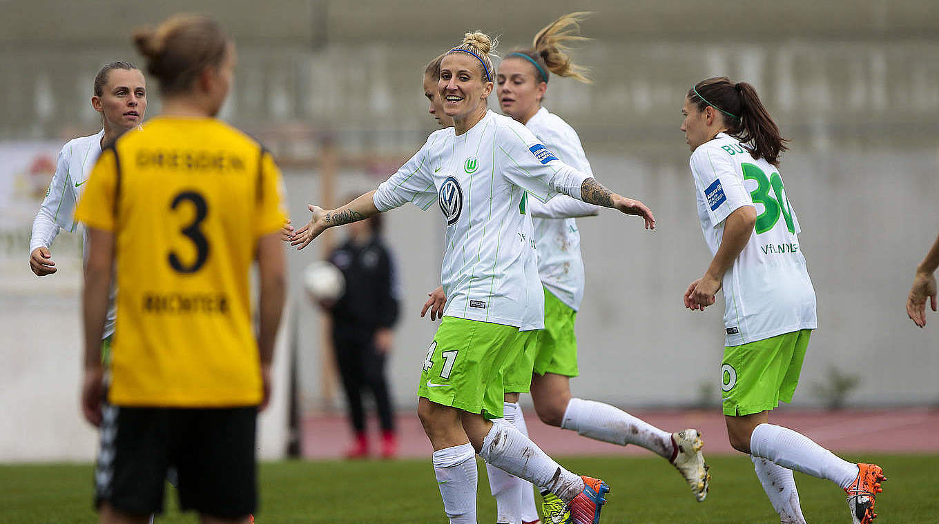 "Women's football in Germany is leading the way globally." - Anja Mittag © 