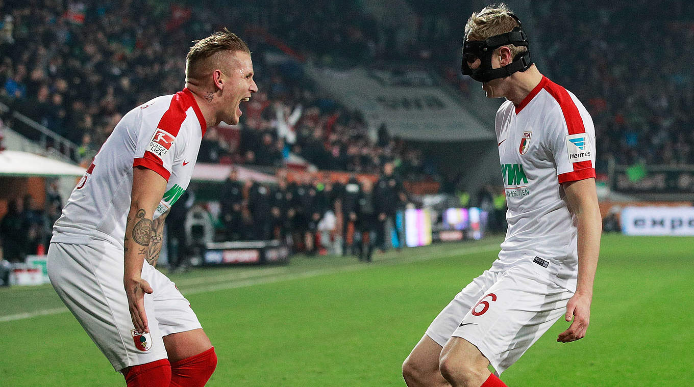 Goalscorer Hinteregger celebrates with Jonathan Schmid © 2016 Getty Images