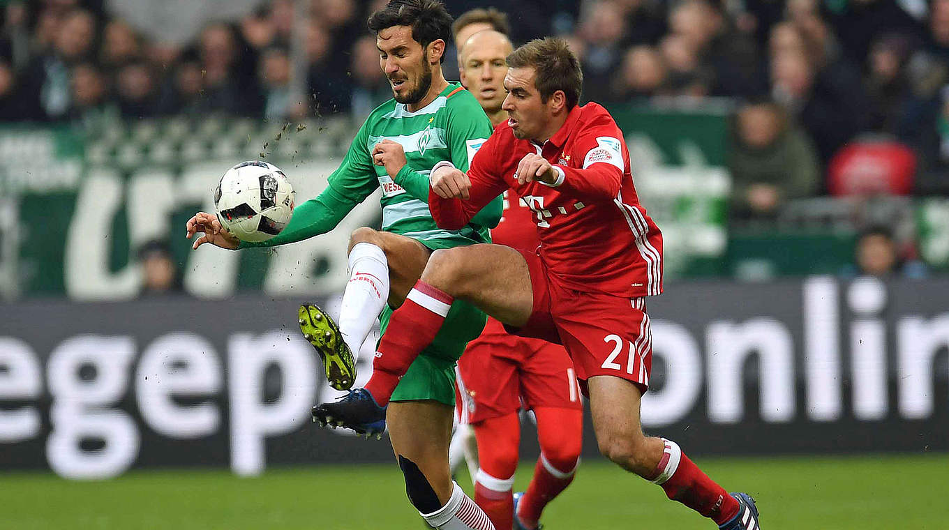 13. Sieg in Serie im Duell mit Werder: Philipp Lahm (r.) und der FC Bayern © AFP/Getty Images