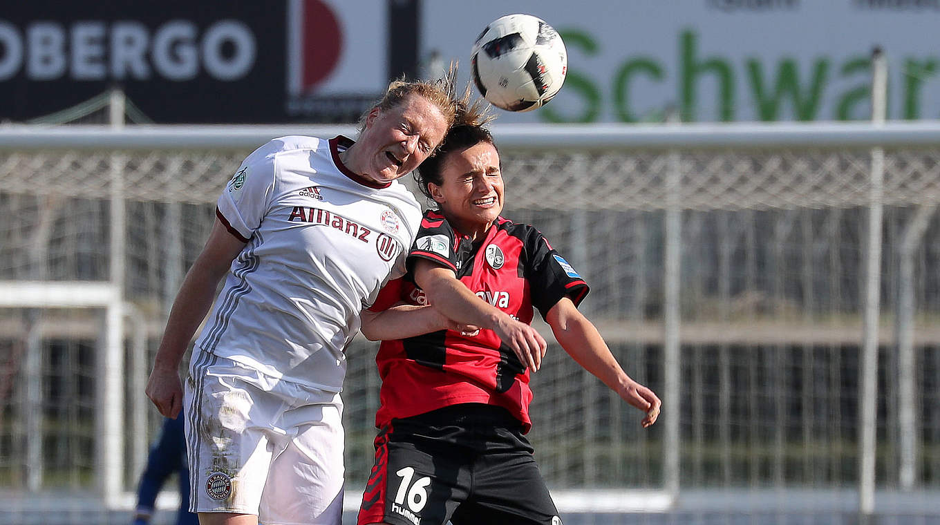 Überragt alle: FCB-Torschützin Melanie Behringer (l.) im Kopfballduell mit Lina Magull © Jan Kuppert