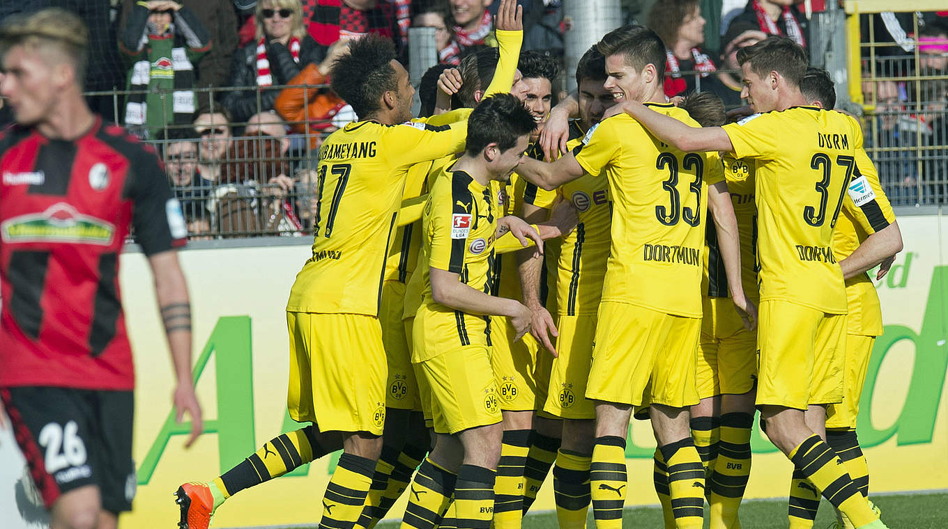 Dortmund celebrate an away win in Freiburg © AFP/Getty Images