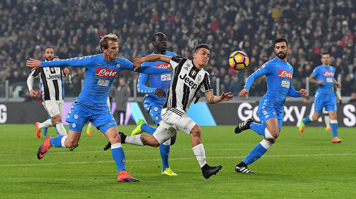 Juventus' Paulo Dybala fouled  © 