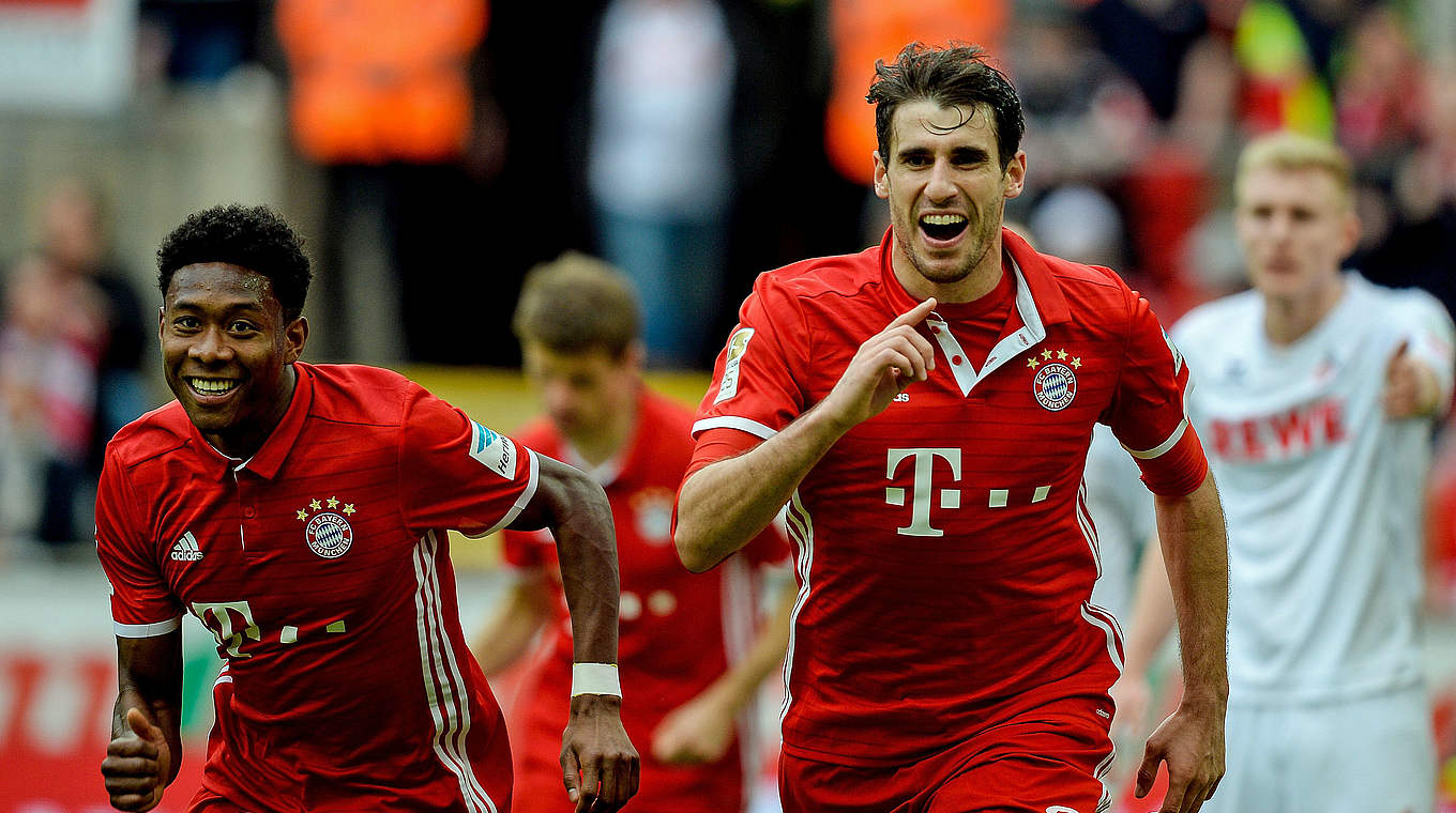 Javi Martinez celebrates scoring the opener for Bayern Munich in Cologne. © AFP/Getty Images