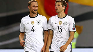 Two World Cup winners: 'Bene' Höwedes (left) and Thomas Müller. © 2016 Getty Images