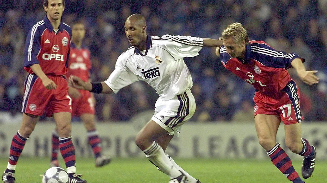 Real Madrid's Nicolas Anelka (C) fights for the ba © This content is subject to copyright.