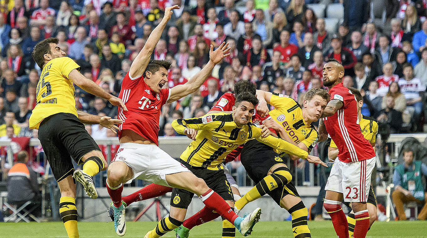 Cup games between Bayern and Dortmund are always tight.  © 