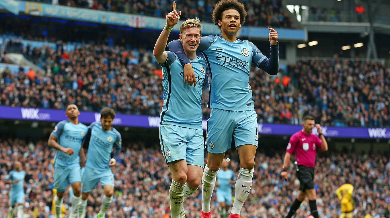 Leroy Sané celebrates with goalscorer Kevin de Bruyne after Manchester City's big home win on Saturday afternoon.  © 2017 Getty Images