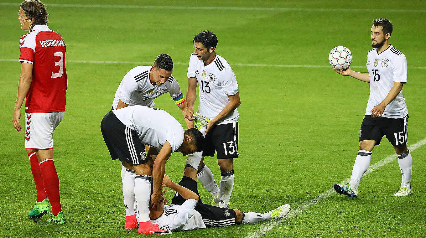 Joshua Kimmich went down with cramp after scoring.  © 