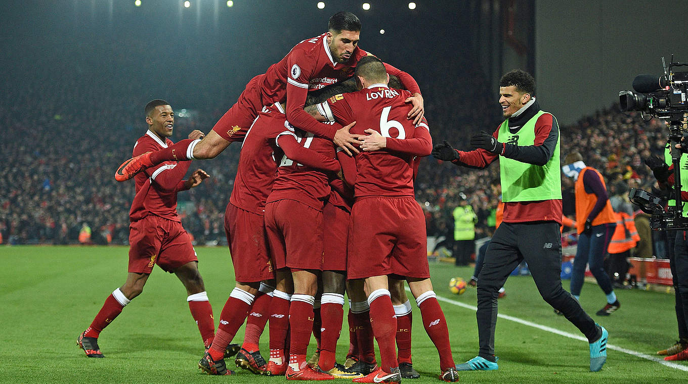 Auf der Jubeltraube: Nationalspieler Emre Can vom FC Liverpool © GettyImages