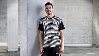 Jonas Hector in the new Germany training kit made from recycled plastic waste © adidas