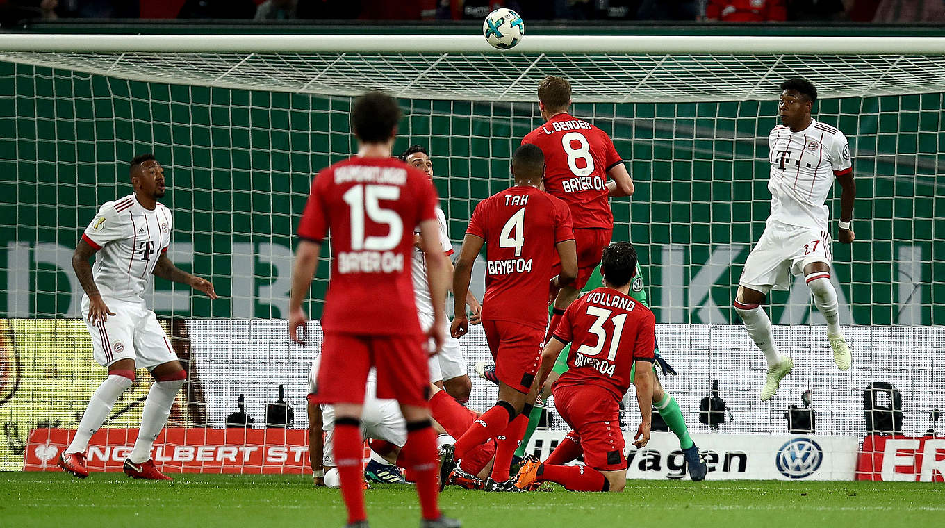 Lars Bender jumps highest to pull a goal back for Leverkusen. © 2018 Getty Images