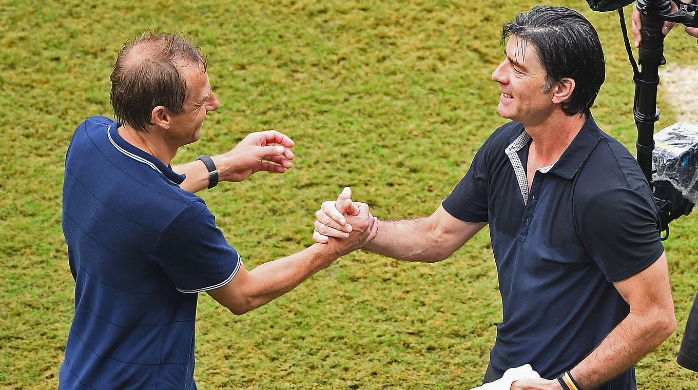 All smiles: Joachim Löw and Jürgen Klinsmann face off before the final group game against the USA © Getty Images
