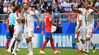 Serbia celebrate Aleksander Kolarov's match-winning goal © AFP/Getty Images