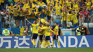 Sweden celebrate in front of their fans after opening the scoring.  © 2018 Getty Images