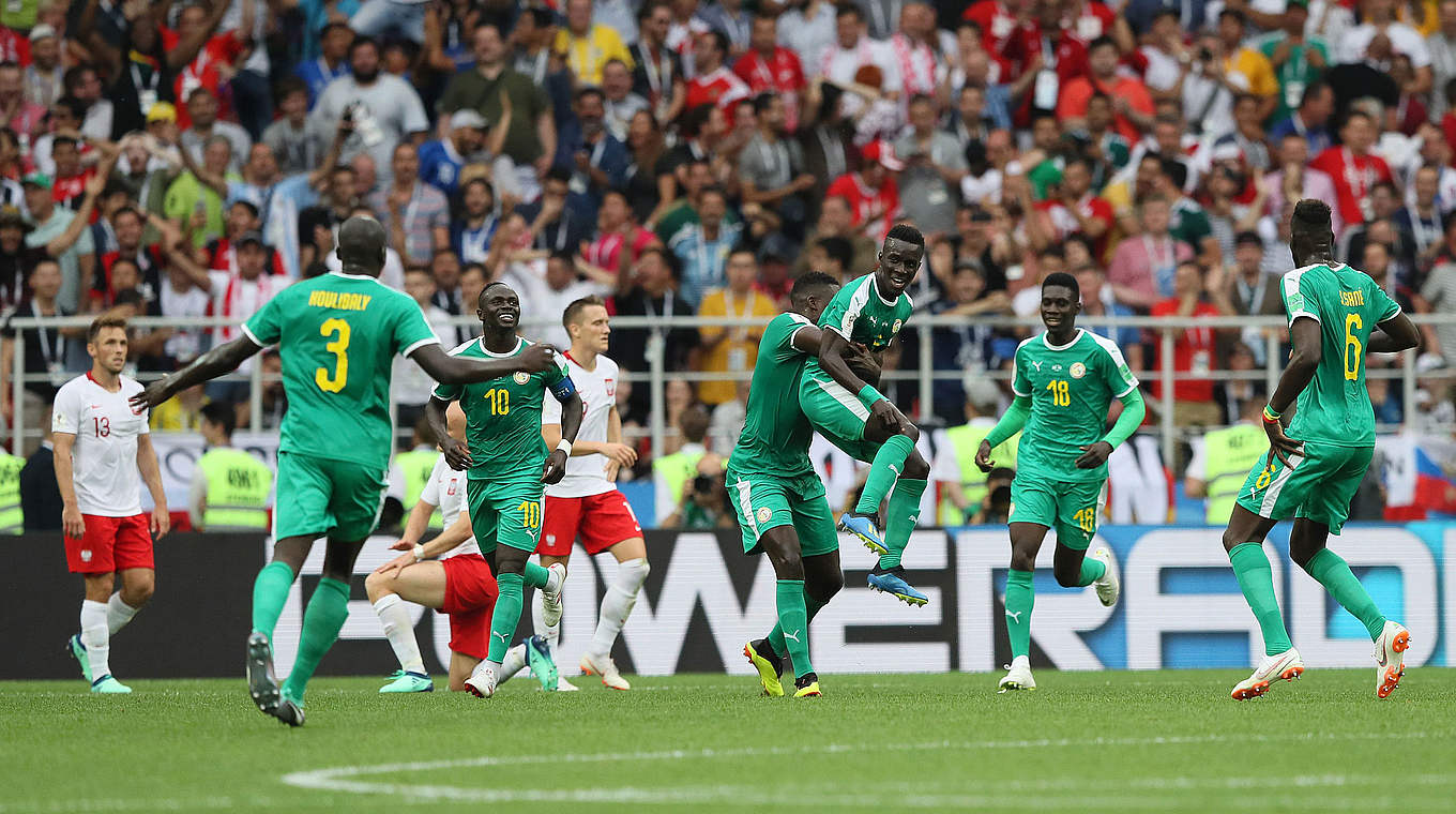 Senegal celebrate their victory - the first by an African team at the tournament.  © 2018 Getty Images