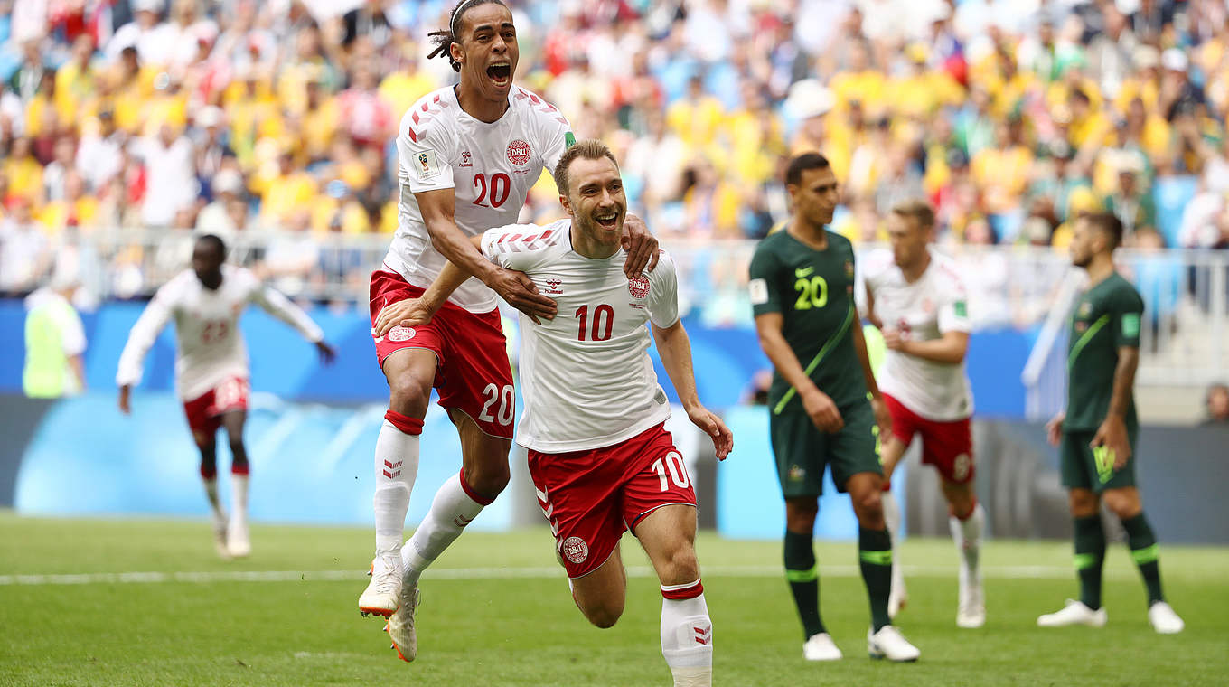 Jump for joy: Yussuf Poulen celebrates with goalscorer, Christian Eriksen © 2018 Getty Images
