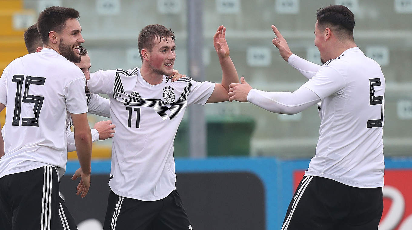 Germany celebrate Yari Otto's goal. © 2018 Getty Images