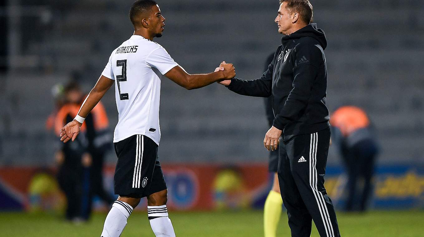 Henrichs and his coach Stefan Kuntz © 2018 Getty Images