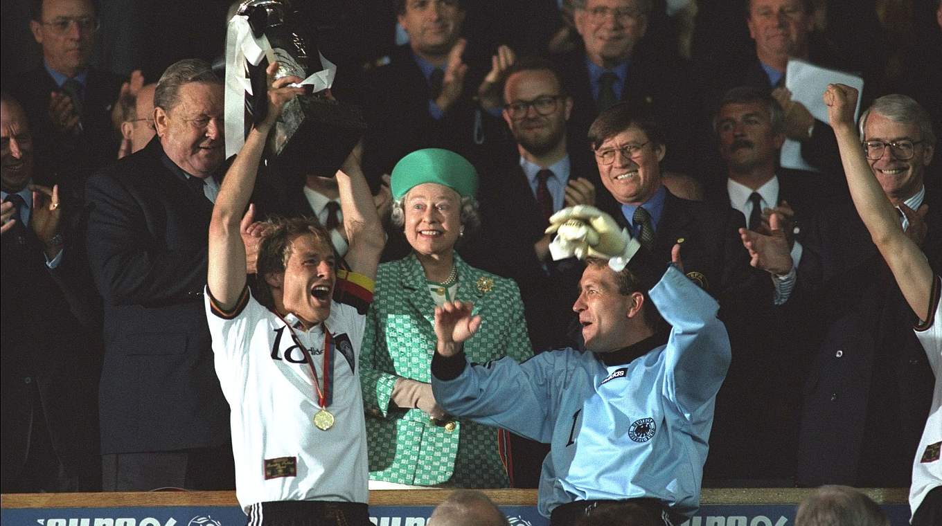 Germany captain Jürgen Klinsmann lifts the European Championship trophy  © 