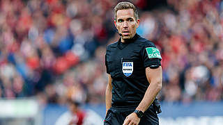 The referee team is excited for the amazing atmosphere in the city and in the Olympiastadion. © imago images / DeFodi