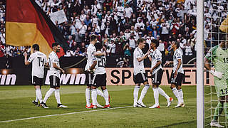 Germany celebrate a thumping 8-0 victory over Estonia. © Philipp Reinhard