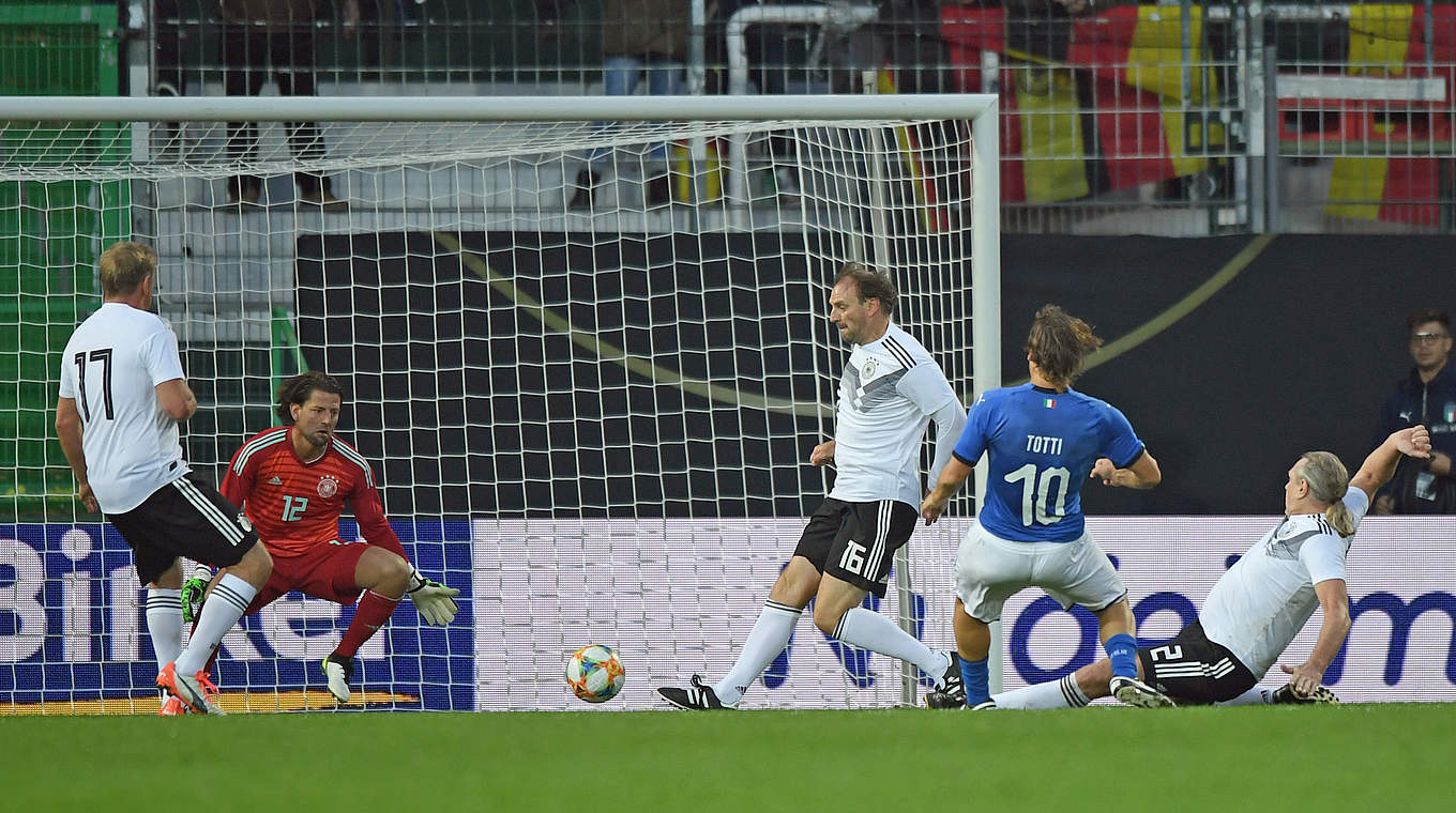 Francesco Totti equalises for Italy.  © 2019 Getty Images