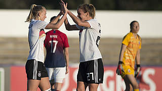 Schüller and Petermann celebrate the opening goal © AFP/Getty Images