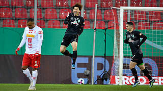 Bremen's Yuya Osako celebrates after scoring the opener for his side.  © imago