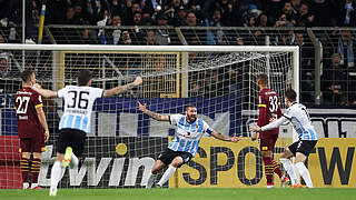 1860 celebrate after netting the winning goal vs. Schalke.  © Getty Images