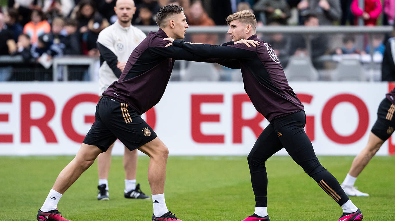 Nico Schlotterbeck (l.) und Timo Werner (r.) © DFB