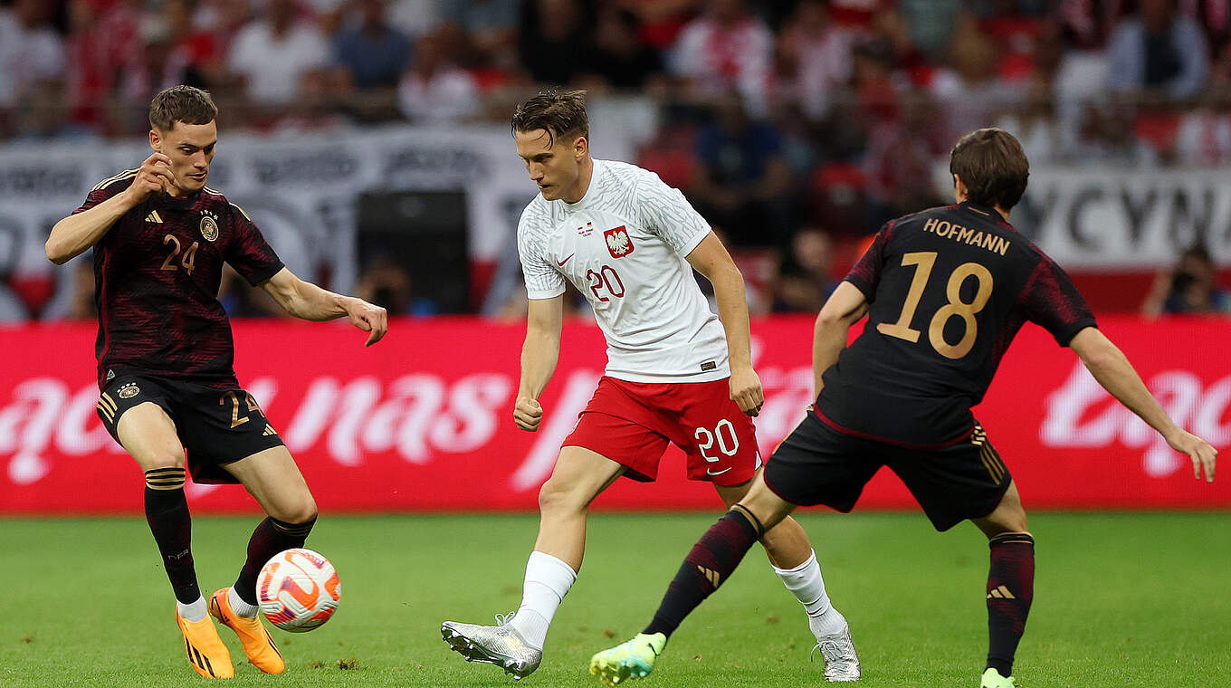 Florian Wirtz (l.), Piotr Zieliński (m.) und Jonas Hoffmann © Getty Images