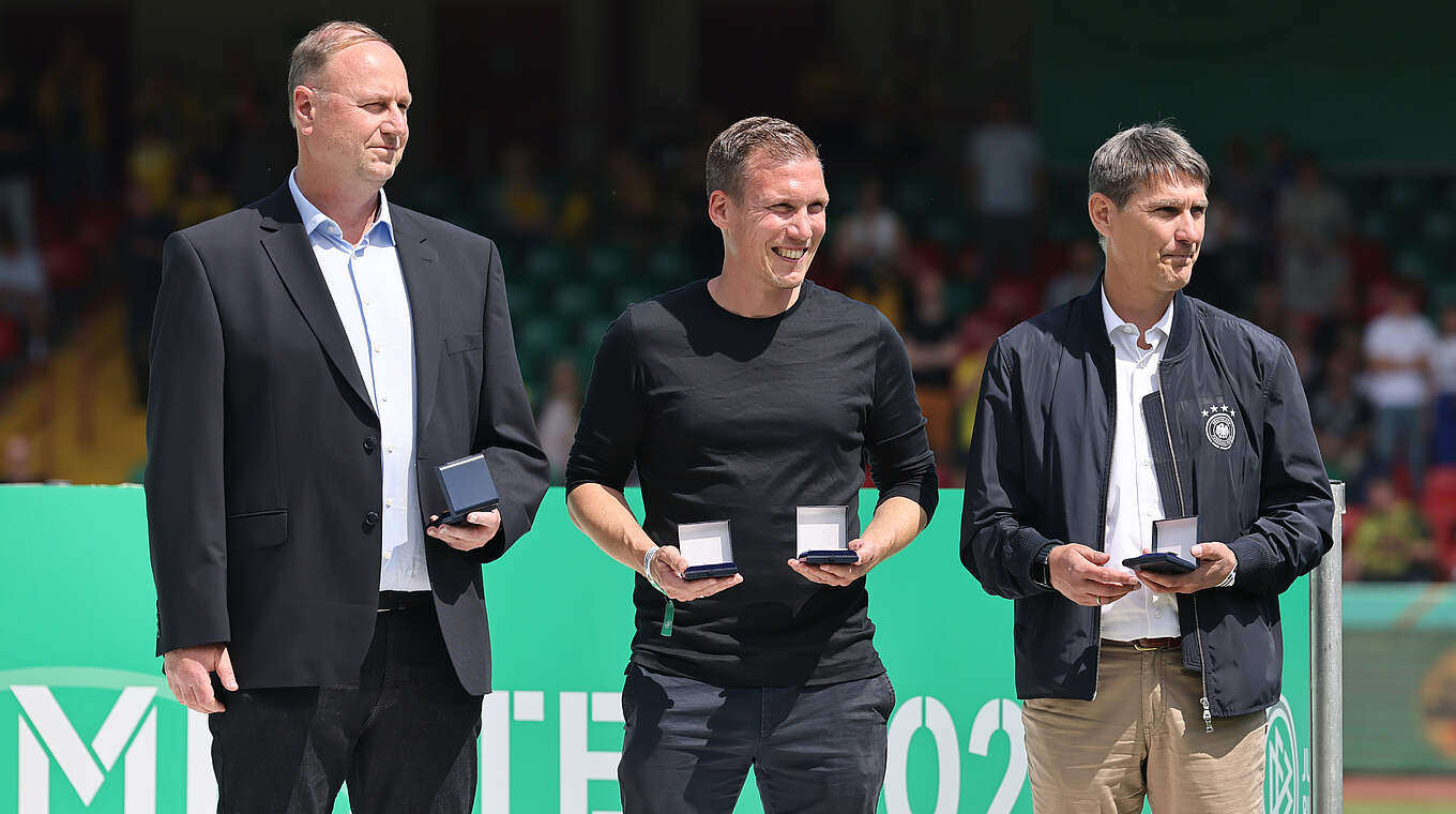 Holger Bellinghoff, Hannes Wolf und Michael Prus (v.l.): "Werbung für den Jugendfußball" © Getty Images