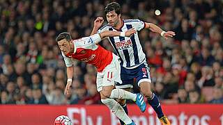 Özil and Arsenal are well placed for direct Champions League qualification © 