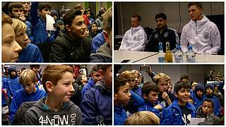 Leuchtende Augen: Die Kinder stellen Maximilian Arnold und Niklas Stark viele Fragen © DFB-TV