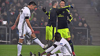 Lucas Perez and Mesut Özil celebrate Arsenal's 4-1 win away in Basel  © AFP/Getty Images