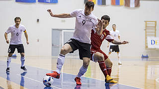 Marc Philipp Nebgen shielding the ball from Armenia's Edgar Kirakosyan  © 2017 Getty Images