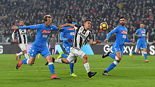 Juventus' Paulo Dybala fouled  © 
