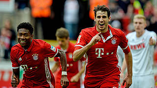 Javi Martinez celebrates scoring the opener for Bayern Munich in Cologne. © AFP/Getty Images