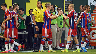 Kommen erst kurz vor Schluss ins Spiel: Lahm (r.) und Schweinsteiger (3.v.r.) © 2014 Getty Images